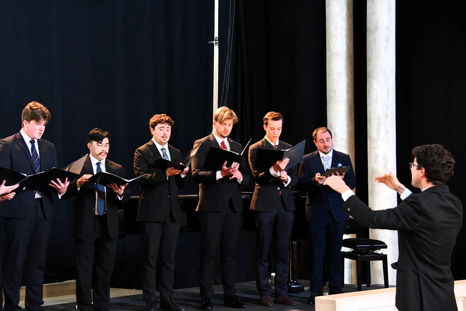 The male singers performing